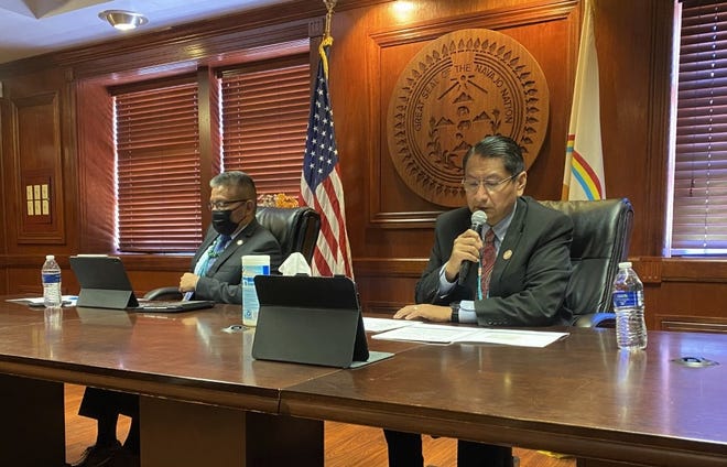 Navajo Nation President Jonathan Nez, right, and Vice President Myron Lizer give the State of the Nation address to the Navajo Nation Council at the spring session on April 19 from the presidential office in Window Rock, Arizona.