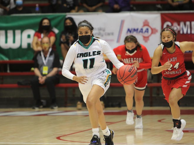 Navajo Prep's Hailey Martin dribbles down the floor in transition against Robertson during the 3A state girls basketball finals on Friday, May 7, 2021, at The Pit in Albuquerque.