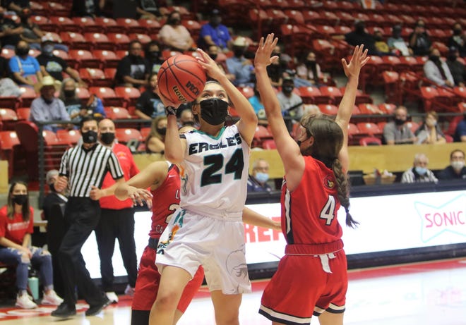 Navajo Prep's Tai Tai Woods drives in for a layup against Robertson during the 3A state girls basketball finals on Friday, May 7, 2021, at The Pit in Albuquerque.