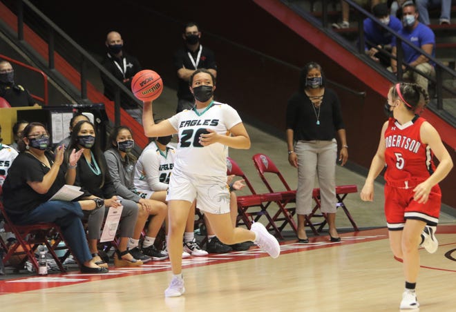 Navajo Prep's Aiona Johnson throws the ball to teammates down the floor against Robertson during the 3A state girls basketball finals on Friday, May 7, 2021, at The Pit in Albuquerque.