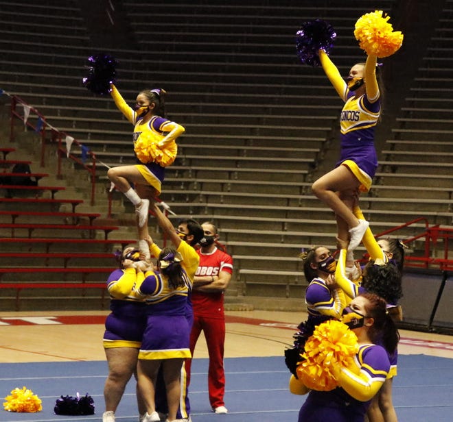 The Kirtland Central Broncos cheer team performs in the Class 4A NMAA State Spirit Championships at The Pit in Albuquerque on May 14, 2021.