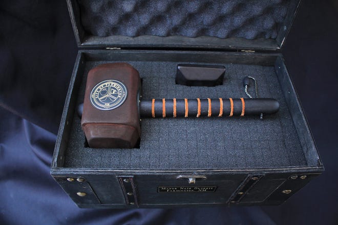 A ceremonial gavel created for Farmington Mayor Nate Duckett and inspired by Thor's hammer rests in its case.