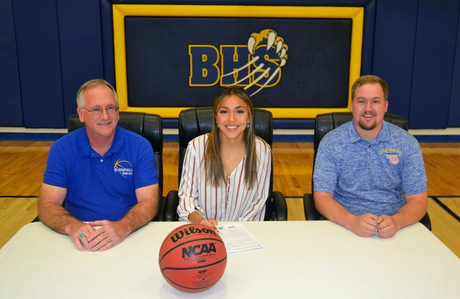 Bloomfield's Madison Bedonie signs her national letter of intent on Friday, May 28, 2021, to continue her basketball career at NAIA Benedictine University at Mesa.
