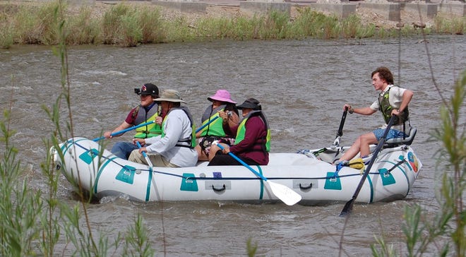 Rafters enjoy a trip down the Animas River during the inaugural Animas River Jam on May 29, 2021, in Farmington.