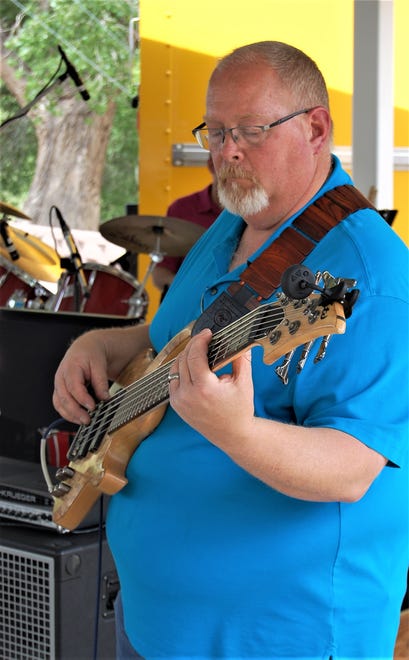 Bassist Tom Maddox performs with the Fetz X-tet on May 29, 2021, during the Animas River Jam in Berg Park in Farmington.
