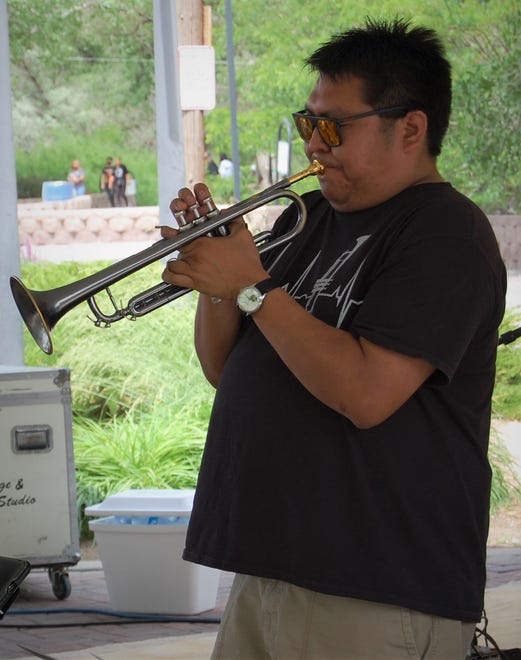 Trumpet player Delbert Anderson performs with the Fetz X-tet on May 29, 2021, in Berg Park in Farmington during the Animas River Jam.