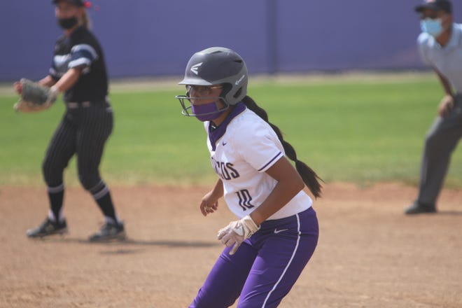 Kirtland Central's Marissa Henry waits for a chance to run to second base against Piedra Vista on Wednesday, June 9, 2021, at KCHS.