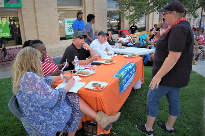 Chef Jacqueline Montoya describes her lamb dish for the judges on July 15 during the Northwest New Mexico Local Food Summit cook-off in Orchard Park.