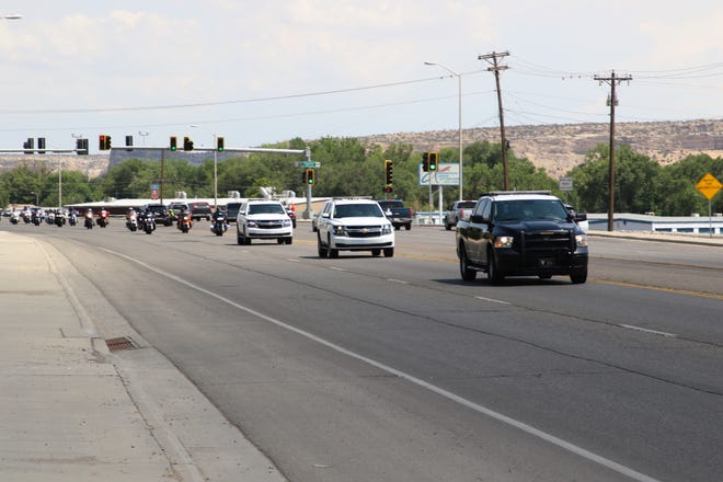 Law enforcement led a motorcade on July 19 on West Main Street in Farmington for the family members of U.S. Army veteran Cecelia B. Finona. Her remains were flown to Albuquerque earlier that day and transported to Shiprock.