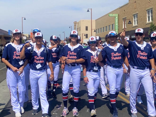 Dallas Patriots players participate in the 2021 Connie Mack World Series parade on July 22 in downtown Farmington.