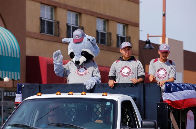The 2021 Connie Mack World Series parade proceeds on Main Street on July 22 in downtown Farmington.