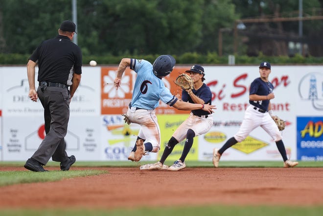 Enid Majors' Bryce Logan receives a throw and tags out D-BAT United's Hudson White at second base in the bottom of the fifth inning of the 2021 Connie Mack World Series championship game on Saturday, July 31, at Ricketts Park.