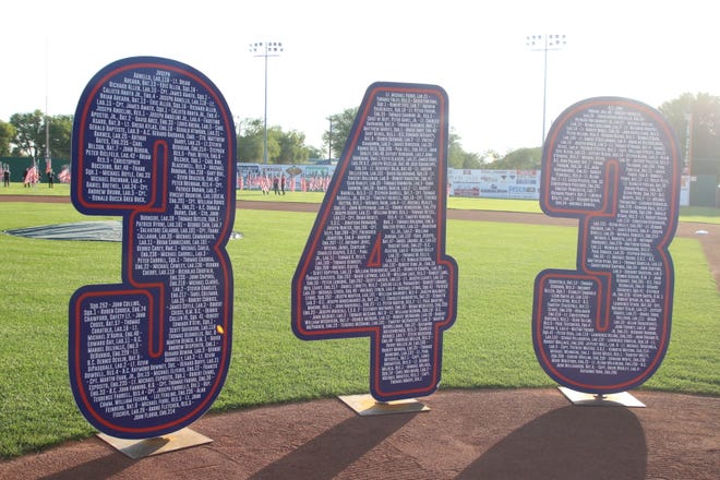 The display, placed in front of home plate at Ricketts Park, honoring the firefighters who lost their lives on Sept. 11, 2001.
