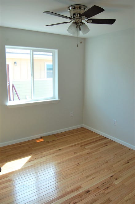 One of the bedrooms of a home built by San Juan College building trades students is pictured.