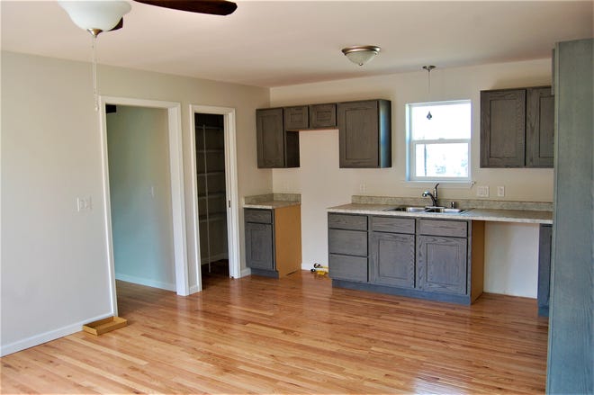 The kitchen of one of the two houses built by San Juan College building trade students is pictured. The house features red oak flooring in the kitchen, living room and two bedrooms.