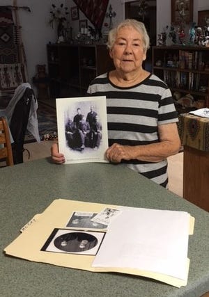 Barbara Hill displays a family photo that will be featured in her presentation on the Hood and McCoy pioneer families on Wednesday, Oct. 13 for the San Juan County Historical Society.