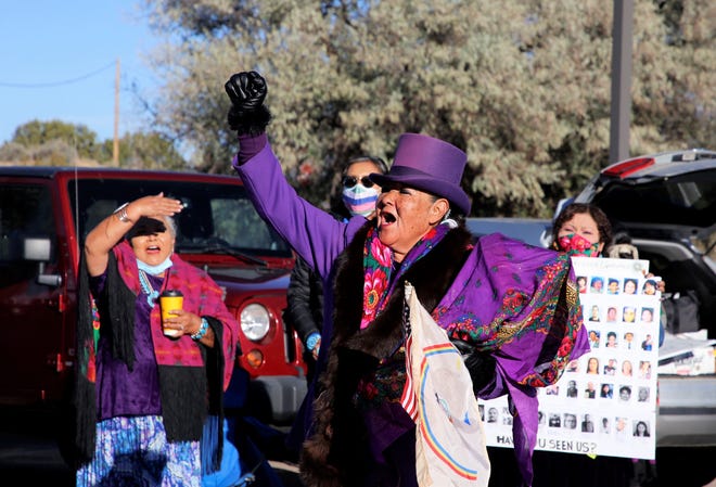 Nicole Walker shares her story about sexual assault before walking in the Diné Sáanii for Justice march on Oct. 18 in Window Rock, Arizona.