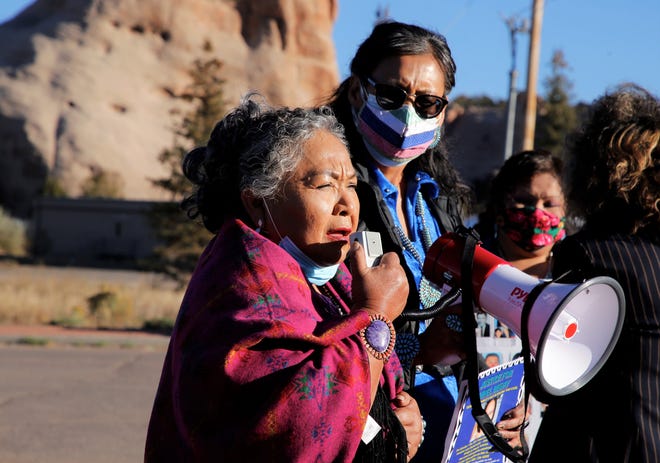 Katherine Benally, one of the founders of Diné Sáanii for Justice, calls on tribal leaders to reform how missing person cases are handle on the Navajo Nation before the group walked to the Navajo Nation Council chamber on Oct. 18 in Window Rock, Arizona.
