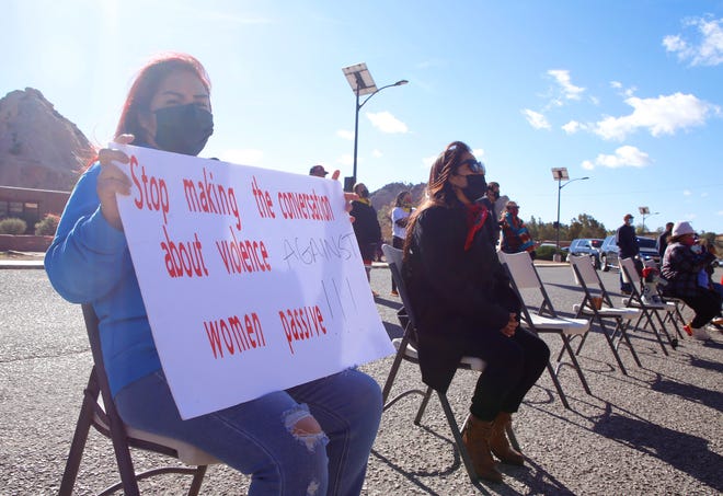 Michelle Kisemh, left, shares a message to Navajo leaders during the Diné Sáanii for Justice march on Oct. 18 in Window Rock, Arizona.