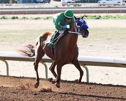 Magic Mosco, ridden by Francisco Amparan for trainer Martin Valdez-Cabral, Jr., draws away from his rivals in the San Juan County Commissioners Handicap, the featured race of the closing day program, Sunday, May 30, 2021 at SunRay Park and Casino.