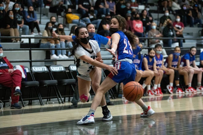 Ilani Delgado (11) works past a defender as the Las Cruces Bulldawgs face off against the Organ Mountain Knights at Organ Mountain High School in Las Cruces on Friday, Fan. 7, 2021.