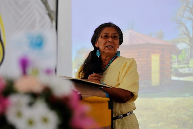 Betty Ojaye, former head of school, talks about the history of Navajo Preparatory School at the celebration for the school's 30th anniversary on May 12 in Farmington.