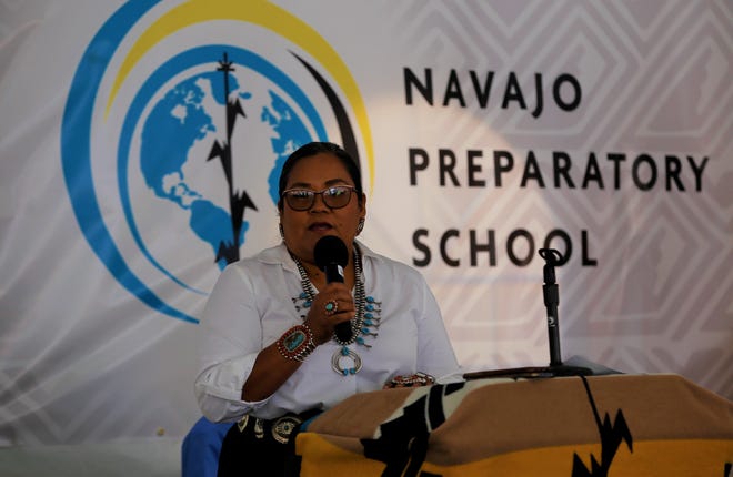 Shawna Becenti, the head of school at Navajo Preparatory School, welcomes audience members to the event to celebrate the school's 30th anniversary on May 12 in Farmington.