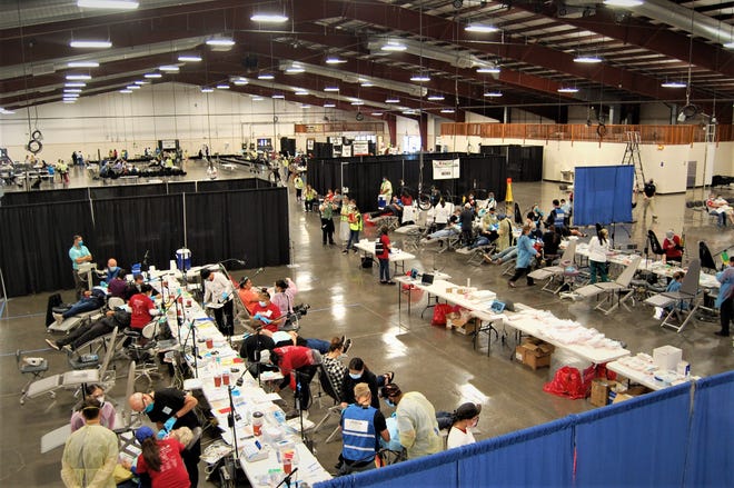 Dozens of patients receive care during the New Mexico Mission of Mercy free dental clinic on Friday, Sept. 23 at the McGee Park Convention Center between Farmington and Bloomfield.