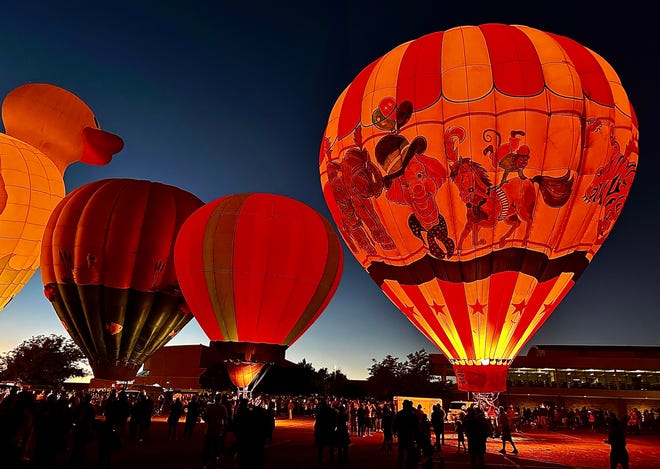 A huge rubber duck and a big top circus tent were among the themes of the glowing hot air balloons that drew hundreds of people to San Juan College Sept. 23 to enjoy the event.